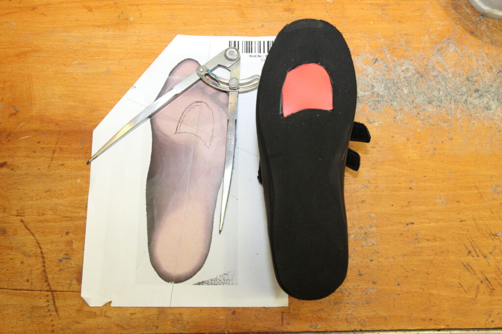 Schuhzurichtungen